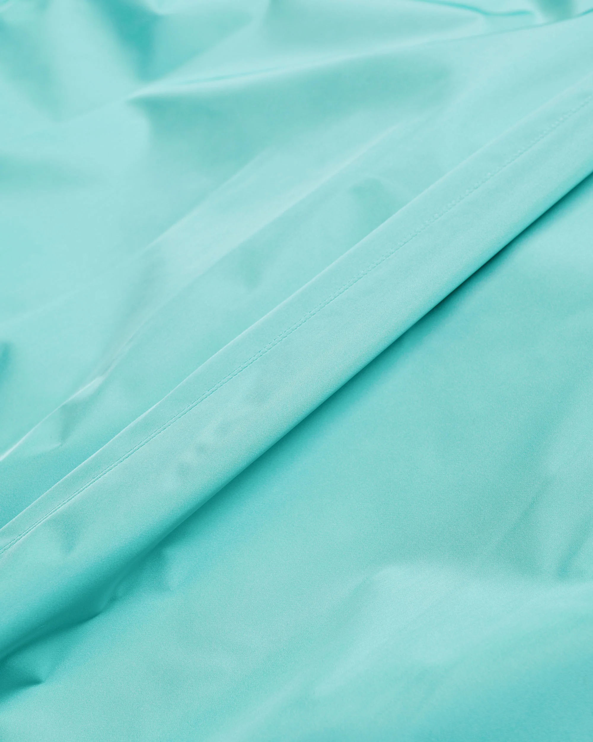 4298-auralee-hard-twist-polyester-satin-laminate-zip-blouson-turquoise-blue-7.webp Auralee Hard Twist Polyester Satin Laminate Zip Blouson Turquoise Blue